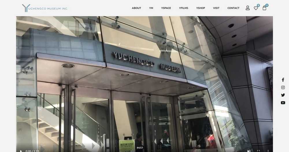 The Yuchengco Museum homepage with a video of the museum's glass entrance under a nav reading About, YM, YSpace, YFilms, YShop, Visit, and Contact
